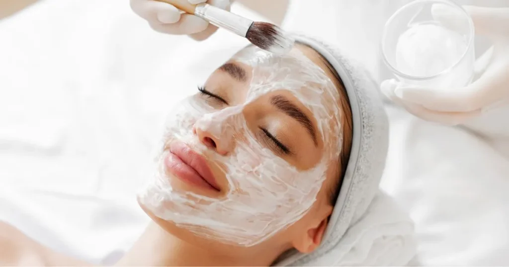 A woman receiving a facial treatment in Pinecrest, FL